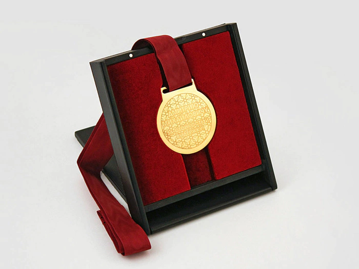 Corporate medal in a transformer stand
